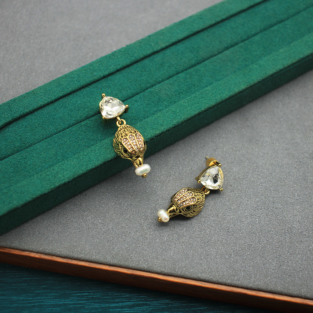 Pendientes Vintage con forma d - Women'S Eagles Accessories reseña y precio
